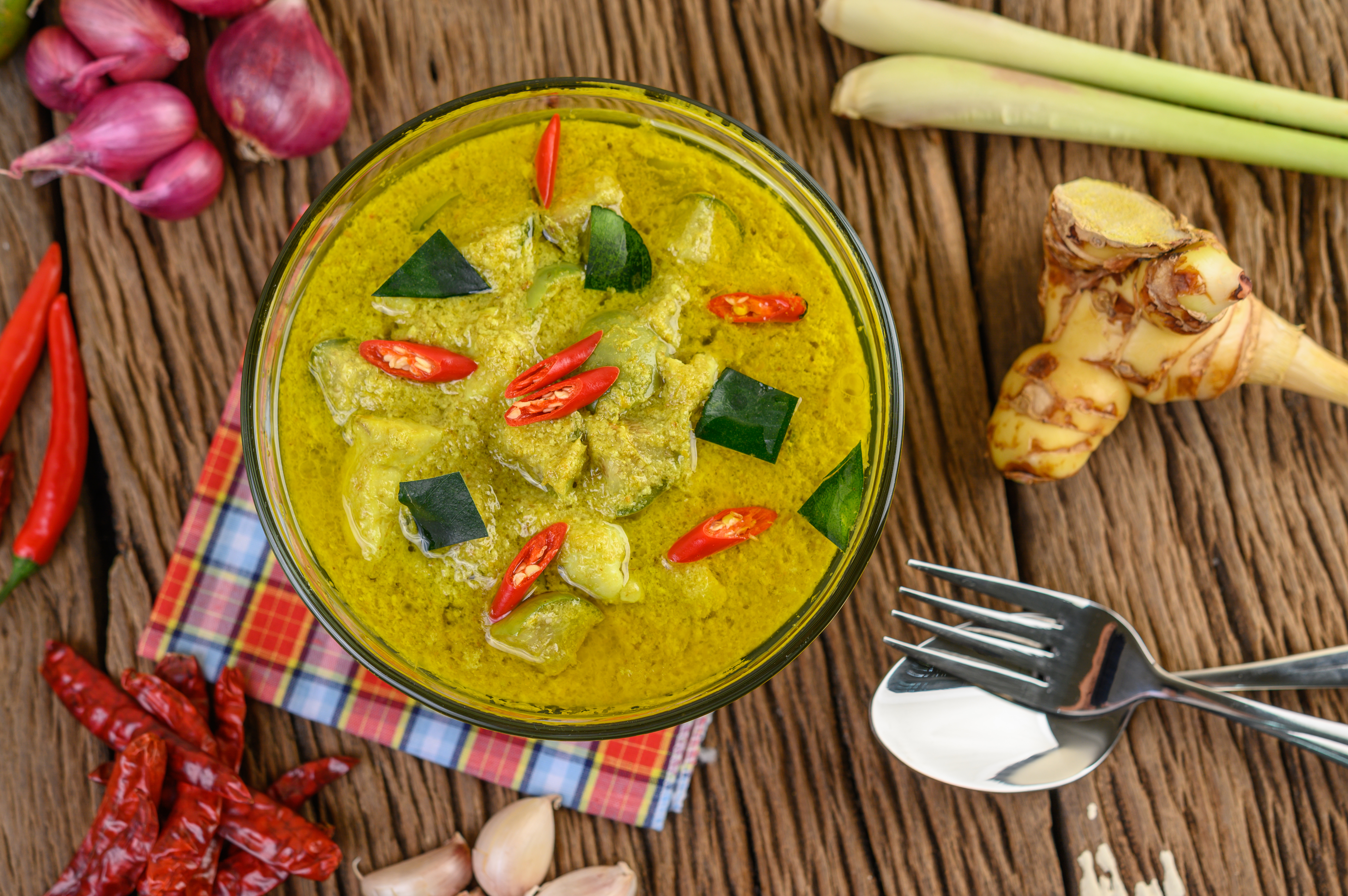 Green curry lobster stew with sweet potatoes and chilies